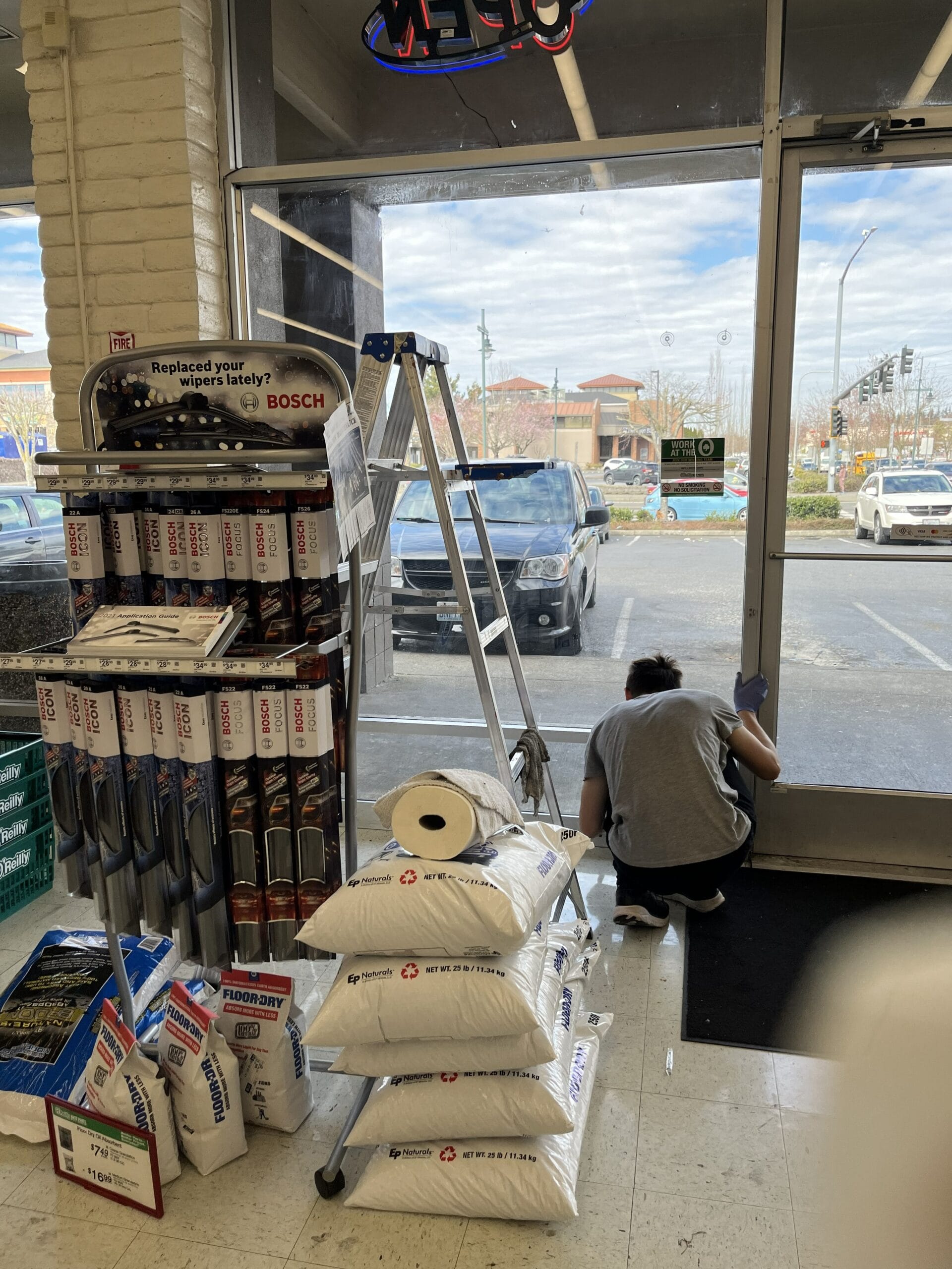 Commercial cleaner detailing high retail store shelves
